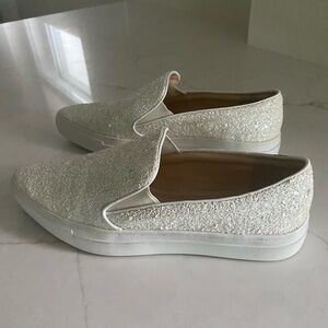 White with a light sparkle Never worn outdoors